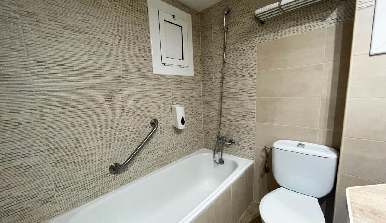 Quarto Twin com Cama Extra (3 Adultos)