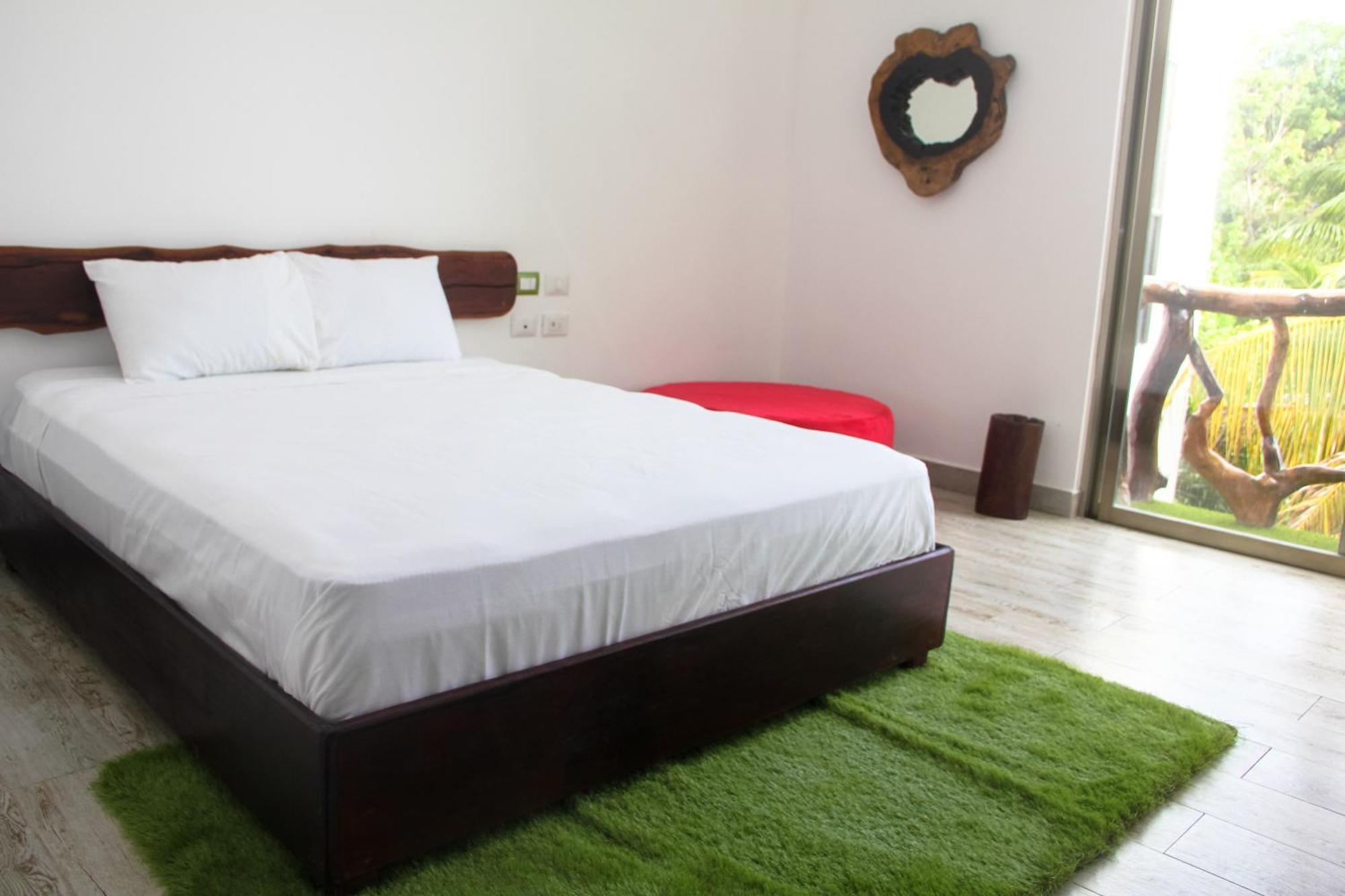 Quarto com Cama Queen-Size e Varanda