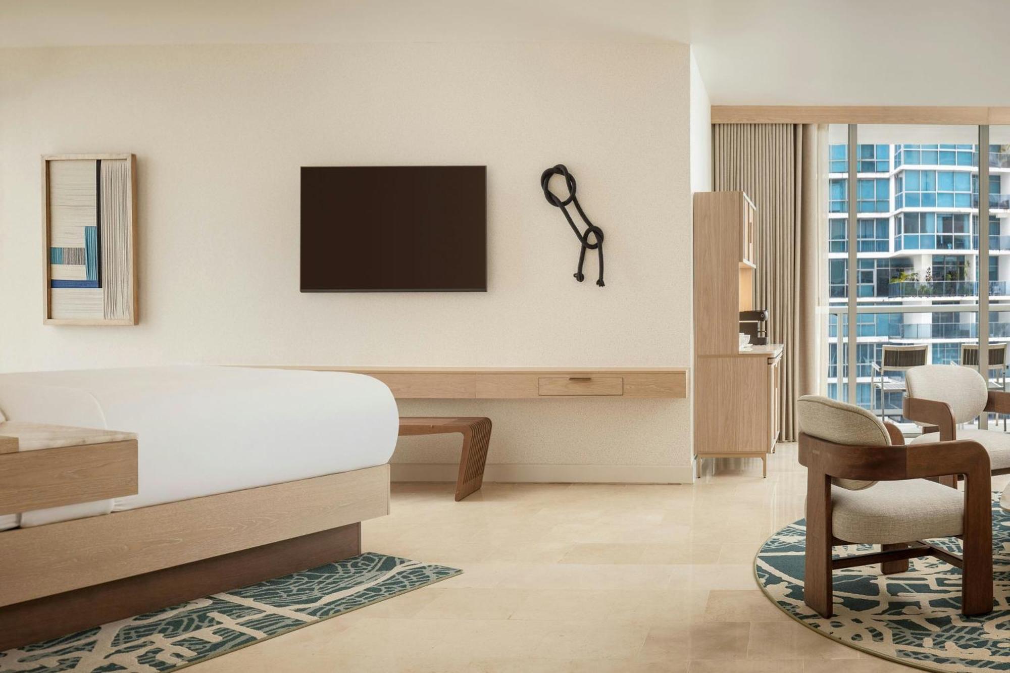 Executive suite king bed balcony partial ocean view