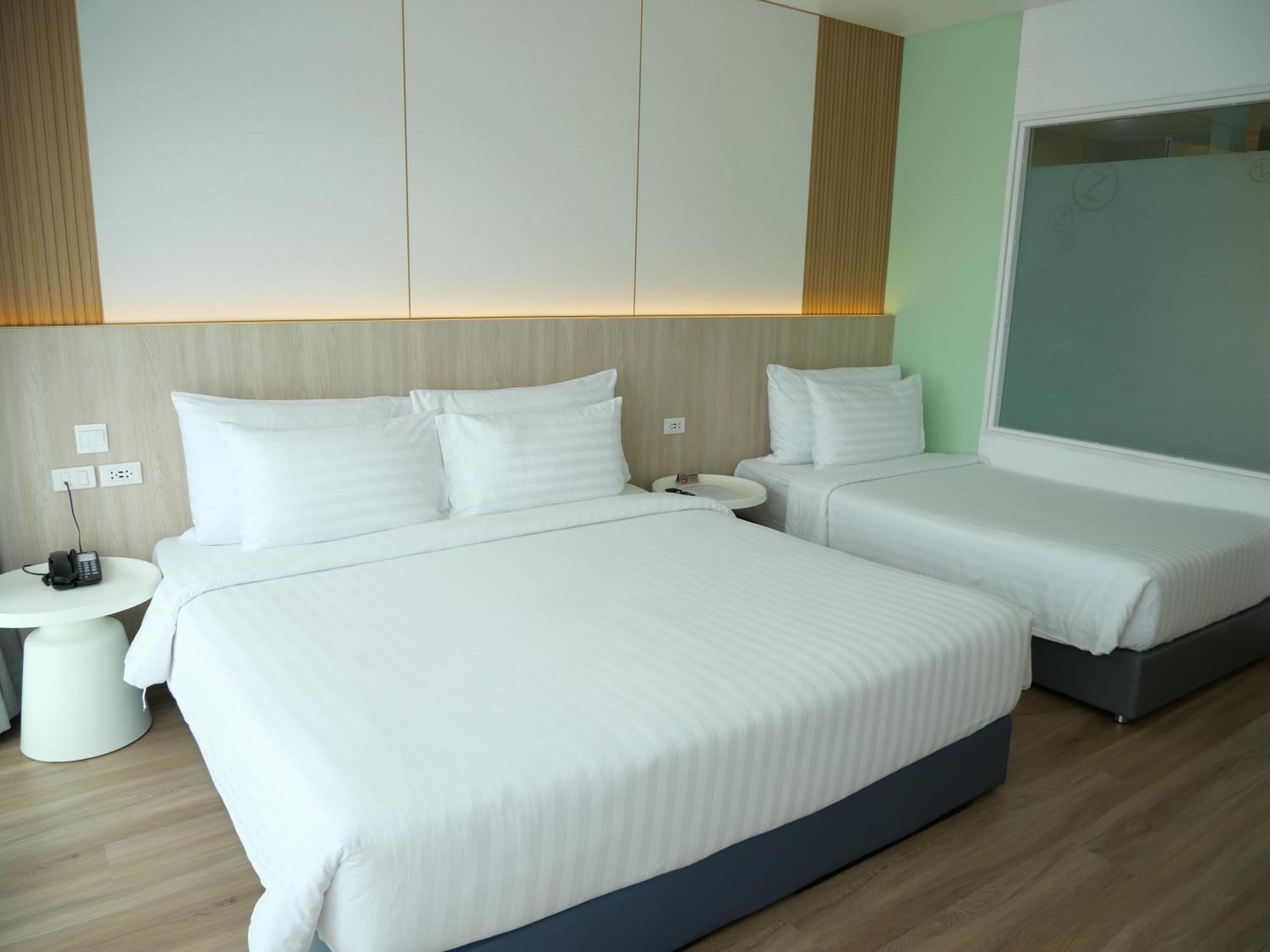 Quarto Deluxe com Cama de Casal ou 2 de Solteiro e Banheira de Hidromassagem