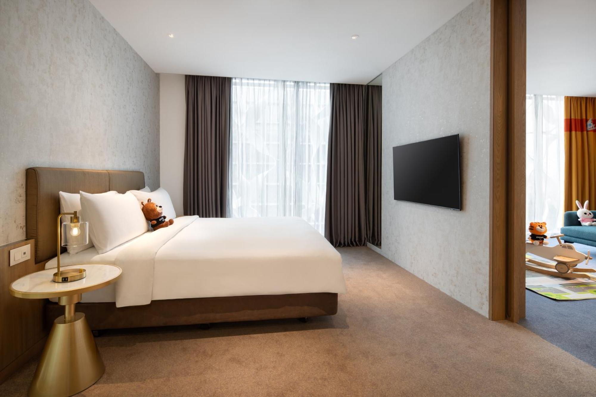 Chambre Familiale Kiztopia - Accès au Salon