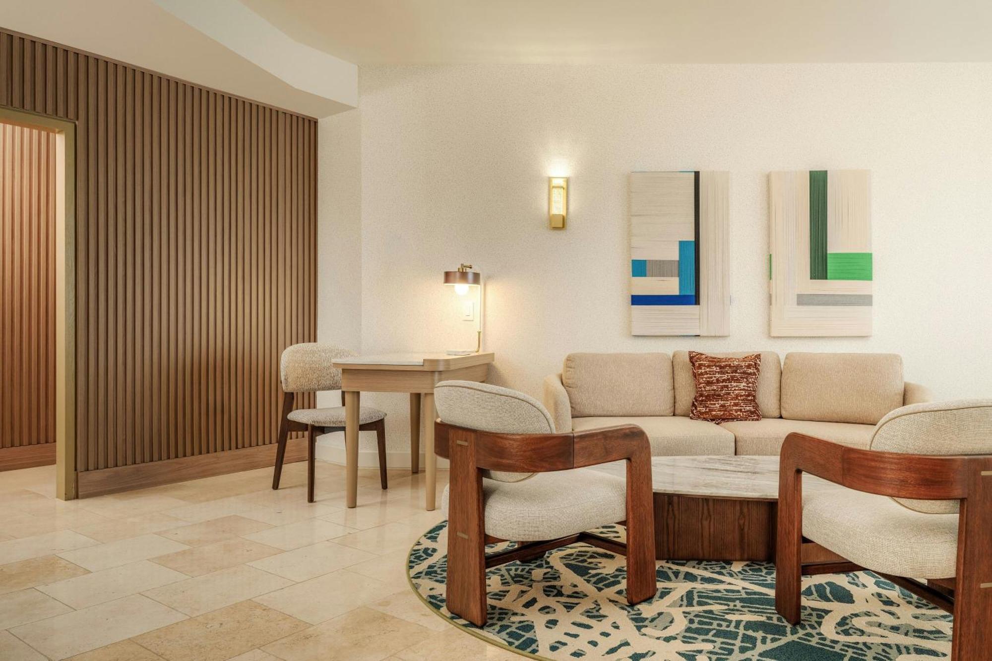 Executive suite king bed balcony partial ocean view